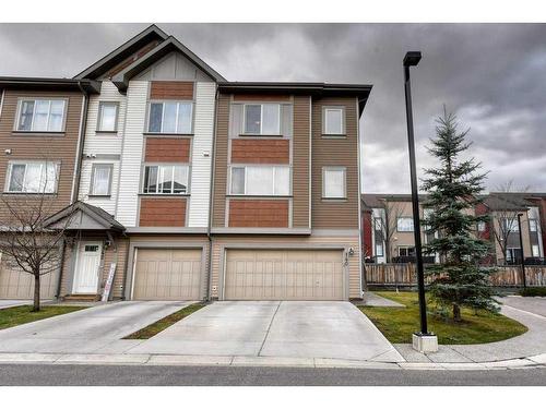 140 Copperpond Villas Se, Calgary, AB - Outdoor With Facade