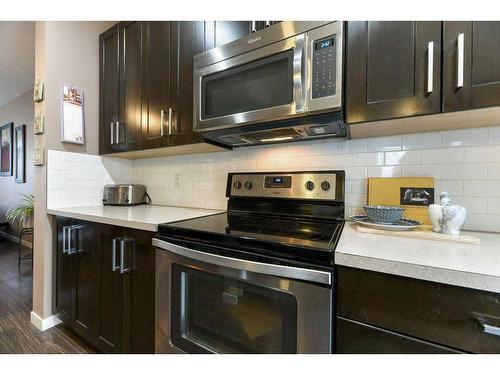 140 Copperpond Villas Se, Calgary, AB - Indoor Photo Showing Kitchen