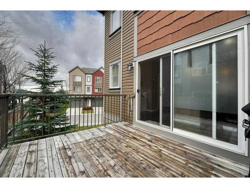 140 Copperpond Villas Se, Calgary, AB - Outdoor With Deck Patio Veranda With Exterior