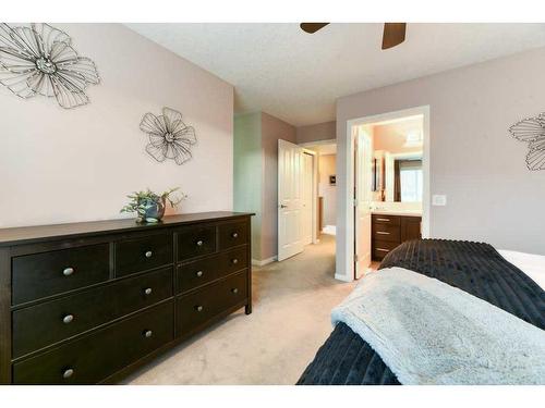 140 Copperpond Villas Se, Calgary, AB - Indoor Photo Showing Bedroom