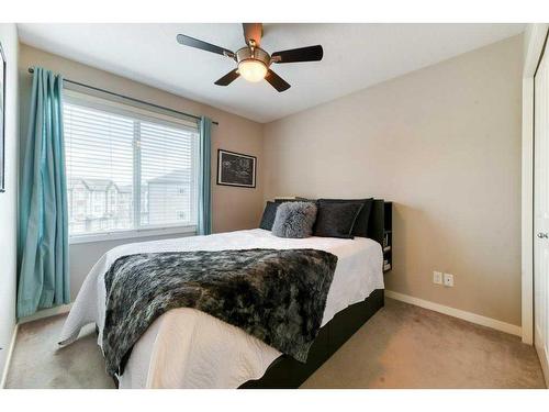 140 Copperpond Villas Se, Calgary, AB - Indoor Photo Showing Bedroom