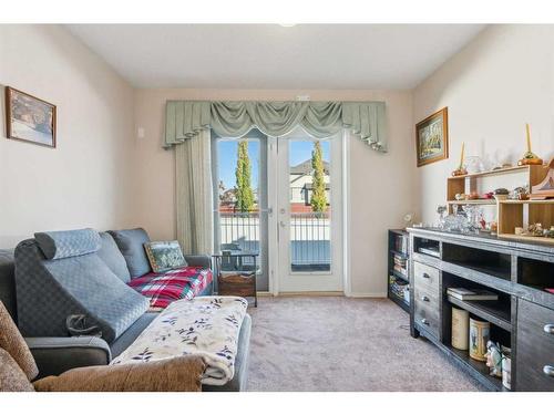 23-12 Woodside Rise Nw, Airdrie, AB - Indoor Photo Showing Living Room