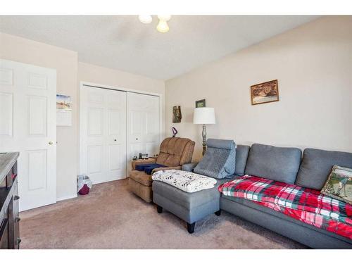 23-12 Woodside Rise Nw, Airdrie, AB - Indoor Photo Showing Living Room