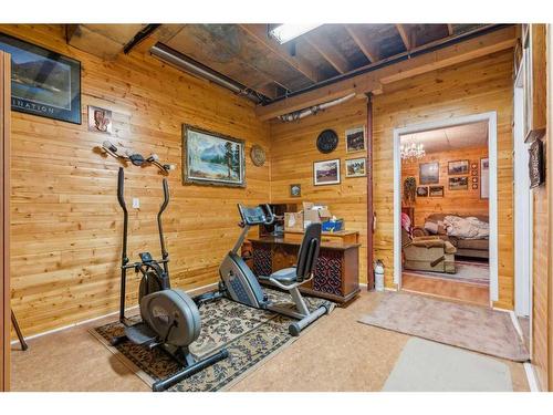 23-12 Woodside Rise Nw, Airdrie, AB - Indoor Photo Showing Gym Room