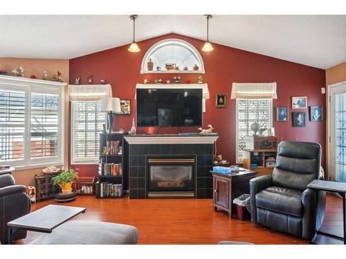 23-12 Woodside Rise Nw, Airdrie, AB - Indoor Photo Showing Living Room With Fireplace