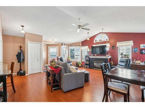 23-12 Woodside Rise Nw, Airdrie, AB - Indoor With Fireplace