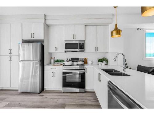 37 Cornerstone Row Ne, Calgary, AB - Indoor Photo Showing Kitchen With Stainless Steel Kitchen With Double Sink With Upgraded Kitchen