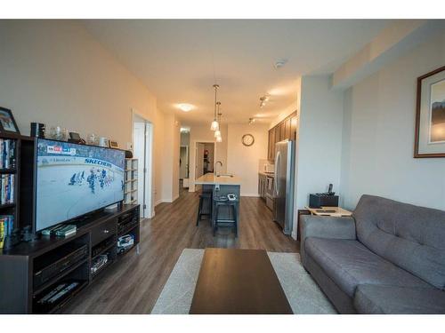 212-30 Shawnee Common Sw, Calgary, AB - Indoor Photo Showing Living Room