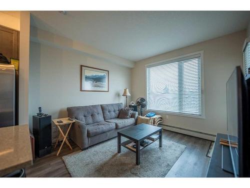 212-30 Shawnee Common Sw, Calgary, AB - Indoor Photo Showing Living Room