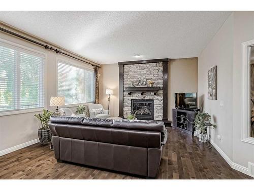 149 Cranridge Terrace Se, Calgary, AB - Indoor Photo Showing Living Room With Fireplace