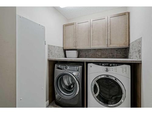 149 Cranridge Terrace Se, Calgary, AB - Indoor Photo Showing Laundry Room