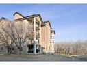 3121-16969 24 Street Sw, Calgary, AB  - Outdoor With Facade 