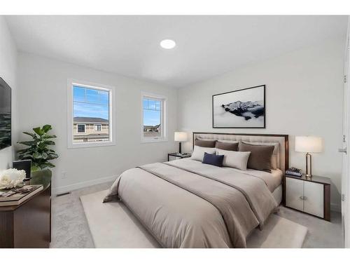 696 Reynolds Crescent Sw, Airdrie, AB - Indoor Photo Showing Bedroom