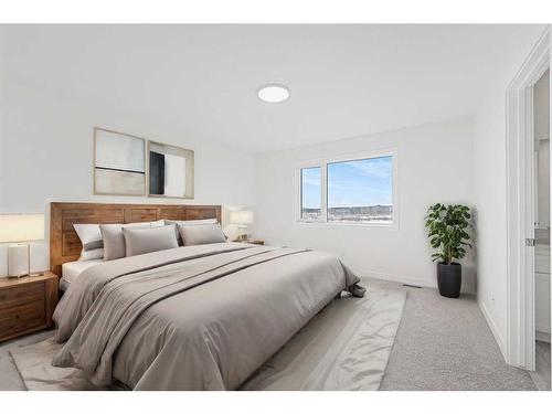 696 Reynolds Crescent Sw, Airdrie, AB - Indoor Photo Showing Bedroom