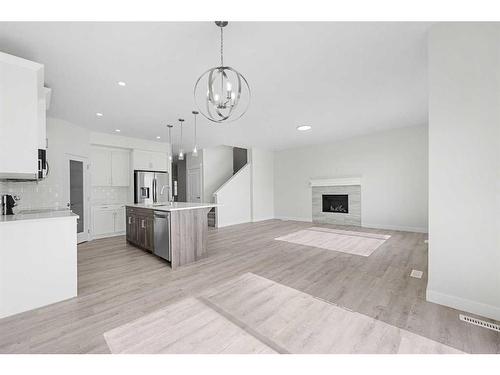 696 Reynolds Crescent Sw, Airdrie, AB - Indoor Photo Showing Kitchen