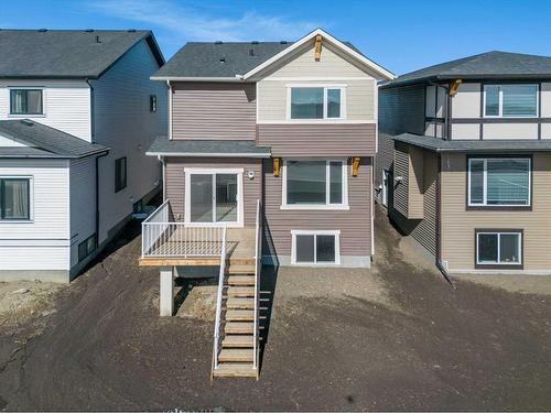 696 Reynolds Crescent Sw, Airdrie, AB - Outdoor With Facade