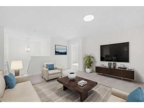 696 Reynolds Crescent Sw, Airdrie, AB - Indoor Photo Showing Living Room