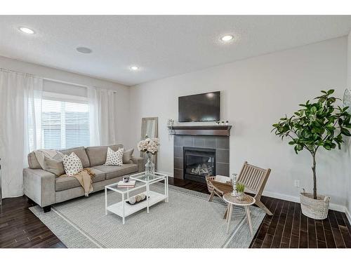 18 Chaparral Valley Place Se, Calgary, AB - Indoor Photo Showing Living Room With Fireplace