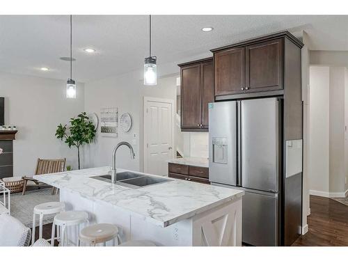 18 Chaparral Valley Place Se, Calgary, AB - Indoor Photo Showing Kitchen With Stainless Steel Kitchen With Double Sink With Upgraded Kitchen