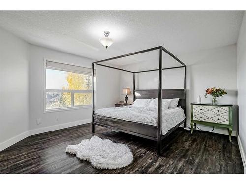 93 Crystal Shores Road, Okotoks, AB - Indoor Photo Showing Bedroom