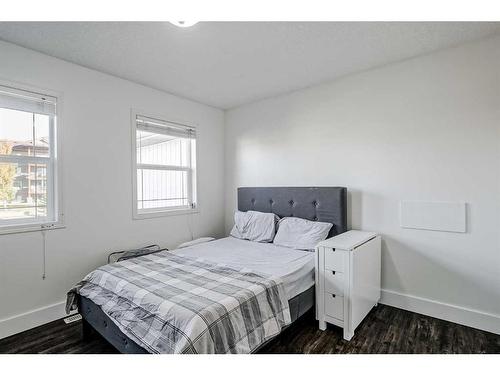 93 Crystal Shores Road, Okotoks, AB - Indoor Photo Showing Bedroom