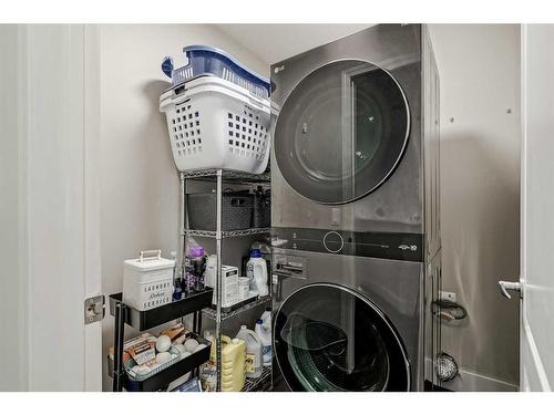 93 Crystal Shores Road, Okotoks, AB - Indoor Photo Showing Laundry Room