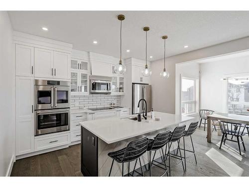 93 Crystal Shores Road, Okotoks, AB - Indoor Photo Showing Kitchen With Stainless Steel Kitchen With Upgraded Kitchen