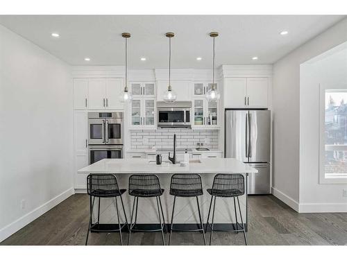 93 Crystal Shores Road, Okotoks, AB - Indoor Photo Showing Kitchen With Stainless Steel Kitchen With Upgraded Kitchen