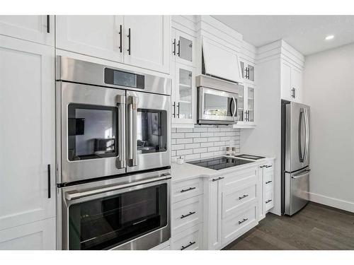 93 Crystal Shores Road, Okotoks, AB - Indoor Photo Showing Kitchen With Stainless Steel Kitchen With Upgraded Kitchen