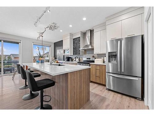 48 Seton Rise Se, Calgary, AB - Indoor Photo Showing Kitchen With Upgraded Kitchen