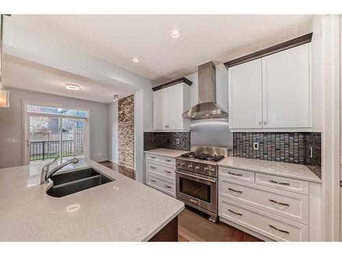 176 Evansridge Circle Nw, Calgary, AB - Indoor Photo Showing Kitchen With Double Sink With Upgraded Kitchen