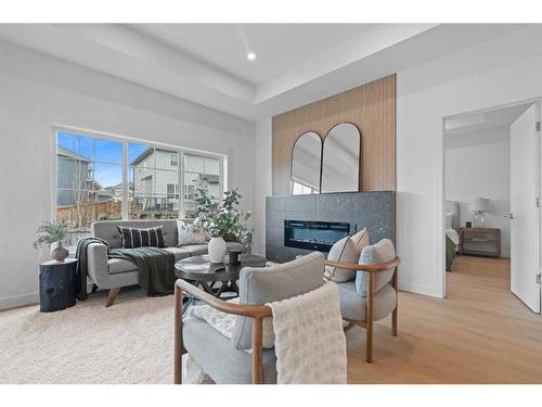 96 Cimarron Springs Circle, Okotoks, AB - Indoor Photo Showing Living Room With Fireplace