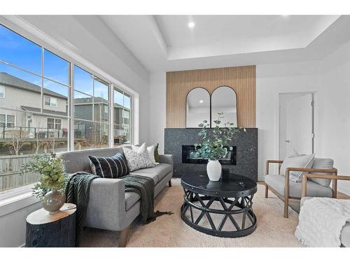 96 Cimarron Springs Circle, Okotoks, AB - Indoor Photo Showing Living Room With Fireplace