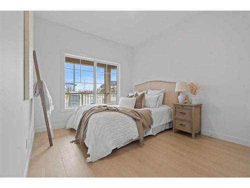 96 Cimarron Springs Circle, Okotoks, AB - Indoor Photo Showing Bedroom