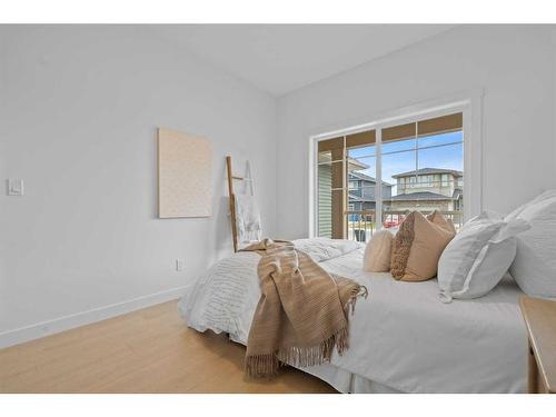 96 Cimarron Springs Circle, Okotoks, AB - Indoor Photo Showing Bedroom