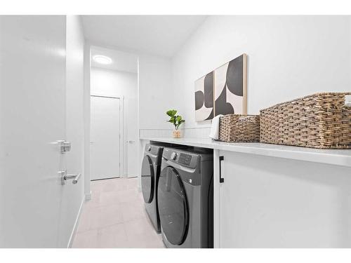 96 Cimarron Springs Circle, Okotoks, AB - Indoor Photo Showing Laundry Room