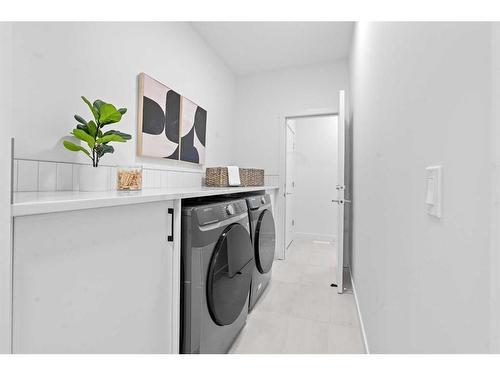 96 Cimarron Springs Circle, Okotoks, AB - Indoor Photo Showing Laundry Room