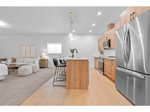 96 Cimarron Springs Circle, Okotoks, AB - Indoor Photo Showing Kitchen With Stainless Steel Kitchen