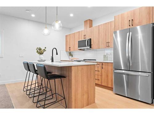 96 Cimarron Springs Circle, Okotoks, AB - Indoor Photo Showing Kitchen With Stainless Steel Kitchen