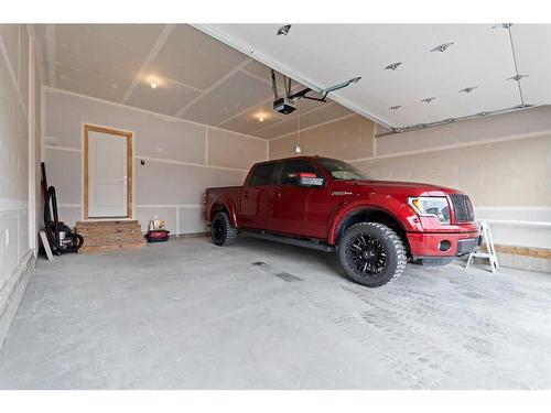 96 Cimarron Springs Circle, Okotoks, AB - Indoor Photo Showing Garage