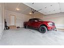 96 Cimarron Springs Circle, Okotoks, AB  - Indoor Photo Showing Garage 