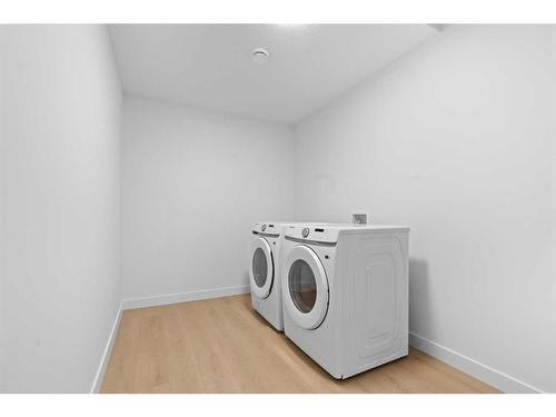 96 Cimarron Springs Circle, Okotoks, AB - Indoor Photo Showing Laundry Room