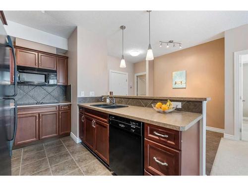 242-60 Royal Oak Plaza Nw, Calgary, AB - Indoor Photo Showing Kitchen With Double Sink