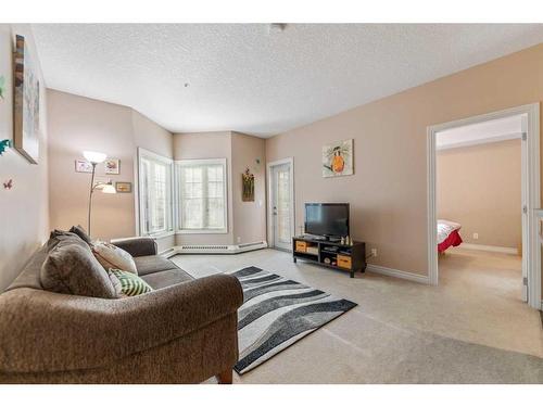 242-60 Royal Oak Plaza Nw, Calgary, AB - Indoor Photo Showing Living Room