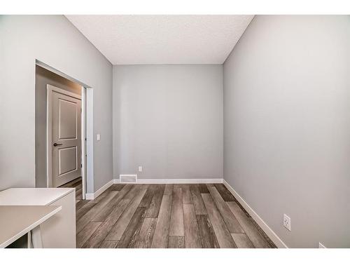 161 Seton Villas Se, Calgary, AB - Indoor Photo Showing Other Room