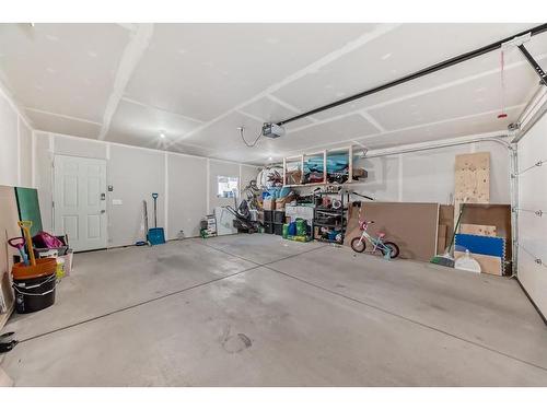 161 Seton Villas Se, Calgary, AB - Indoor Photo Showing Garage