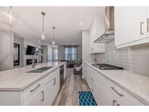 161 Seton Villas Se, Calgary, AB - Indoor Photo Showing Kitchen With Double Sink With Upgraded Kitchen