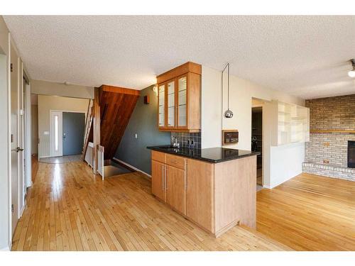 303 Lynnview Road Se, Calgary, AB - Indoor With Fireplace