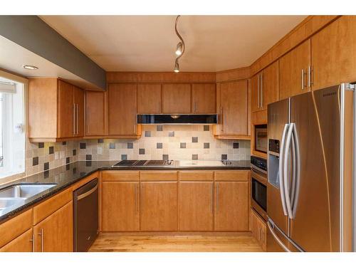 303 Lynnview Road Se, Calgary, AB - Indoor Photo Showing Kitchen With Stainless Steel Kitchen