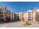 1408-10 Prestwick Bay Se, Calgary, AB  - Outdoor With Balcony With Facade 